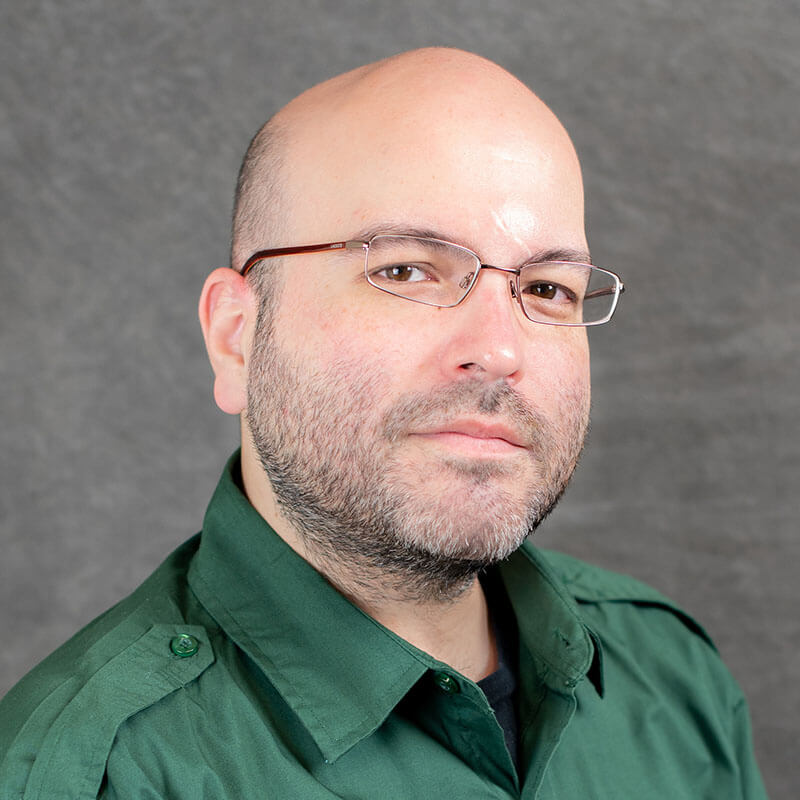 Headshot of Travis Dennison