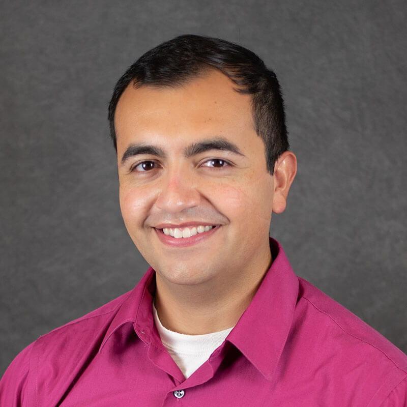 Allen J González Headshot