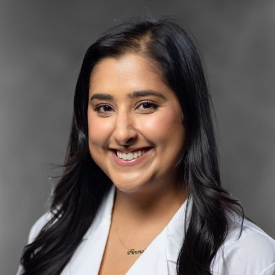 A portrait ofAnmol Malli, MD