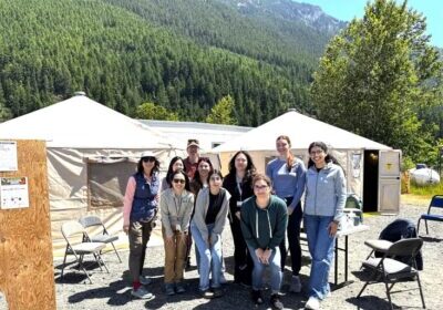 Dr. Zed Zha (left) with the volunteers who participated in Protecting Those Who Protect Us skin cancer screening pilot project at the Washington State Firefighting Training Academy. 