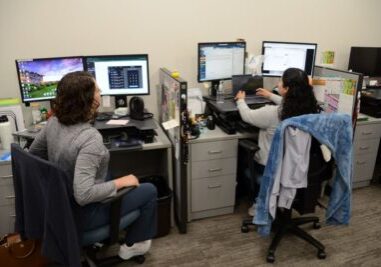 Marissa Pickett, Public Health Nurse, and Alejandra Mendoza, Case Manager, discuss a patient at the New Hope Clinic in Yakima.