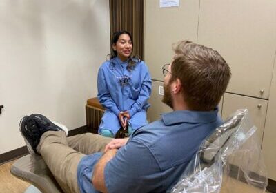 Yanina Diaz, a dental resident in the Northwest Dental Residency Program, consults with a patient at Toppenish Medical-Dental Clinic. 